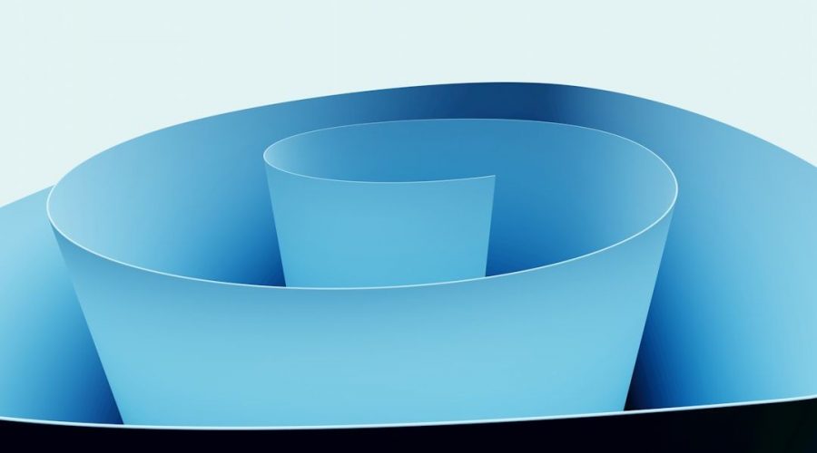 Abstrakt illustration av flödande blå pappersband, som symboliserar integrerade system.